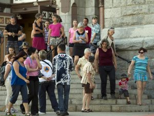 Families of the victims of the train derailment fire leave the church after seeing the crash site for the first time Thursday, July 11, 2013 in Lac-Megantic, Quebec. 