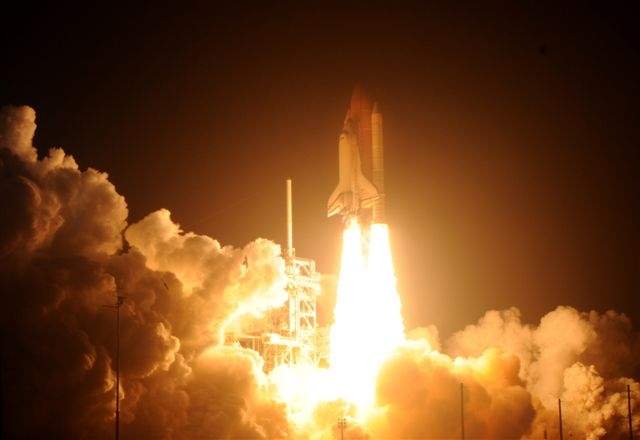 Shuttle blasts off on space station mission - image