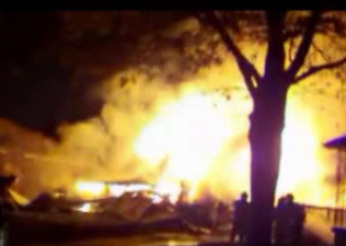 Officials investigate west end house explosion - image