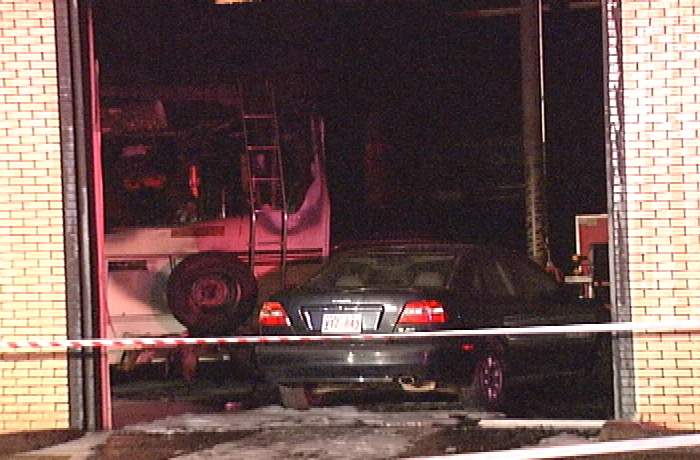 Fire crews investigating automotive shop blaze - image