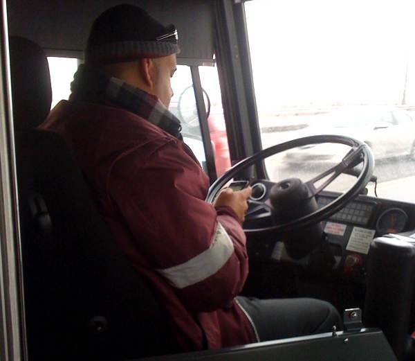 TTC bus driver caught texting while driving - image