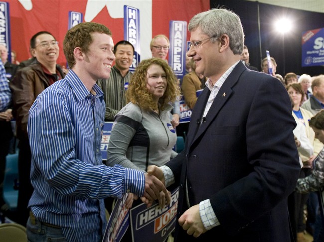 Prime Minister Stephen Harper shakes hands with supporters following a campaign rally in Stratford, P.E.I., Sunday May 1, 2011.
