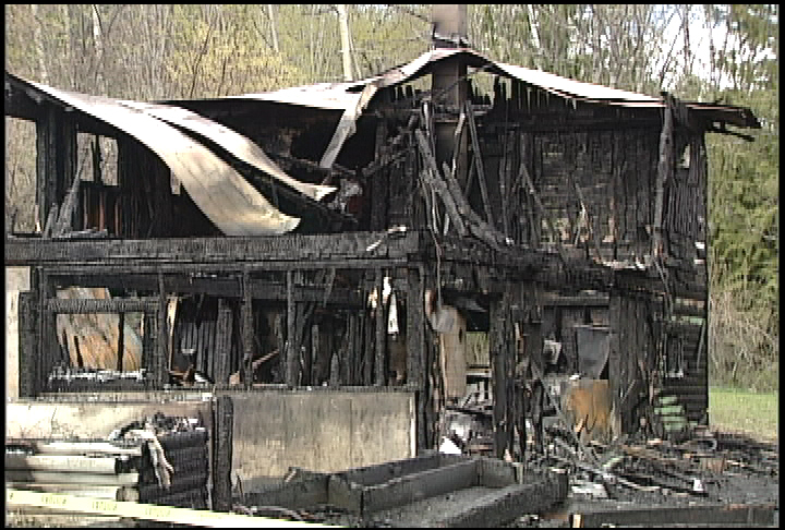 Two people escape from Enderby house fire - image