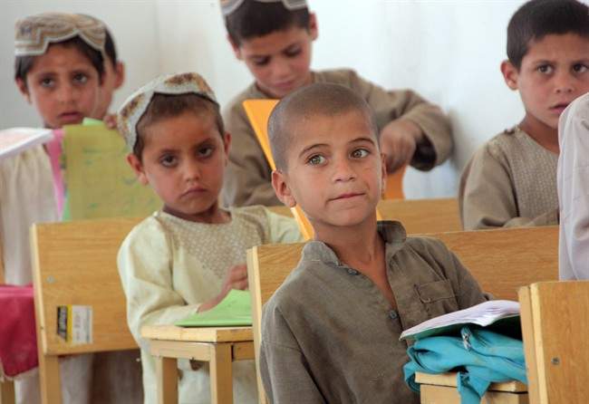 Boys attend school in the town of Salavat, Afghanistan, on Sunday, May 1, 2011. The school has been a Canadian initiative that appears to be succeeding despite insurgent threats. THE CANADIAN PRESS/Colin Perkel.