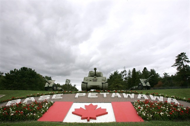 Grey skies loom over the main gate at Canadian Forces Base Petawawa, Ont. About 450 troops from Canadian Forces Base Petawawa sought mental health counselling within a 10-month stretch last year, say internal military records. 
