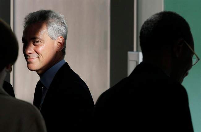 FILE - In this Jan. 4, 2011 file photo, Chicago mayoral candidate Rahm Emanuel waits in the wings before speaking at a news conference at the Better Boys Foundation in Chicago. Now as Emanuel prepares to take over as mayor on May 16, he is shaking things up behind the scenes and moving quickly to put his mark on City Hall. (AP Photo/M. Spencer Green, File).