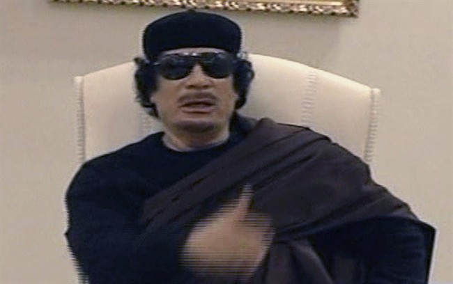 In this image made from Libyan TV, Libyan leader Moammar Gadhafi holds a meeting with tribal leaders from eastern Libya, in Tripoli, Libya, Wednesday, May 11, 2011. (AP Photo / Libyan TV via APTN) TV OUT LIBYA OUT.