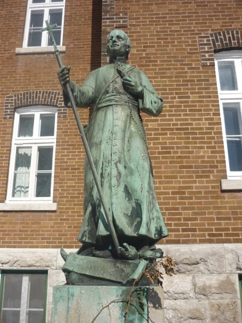 A statue of Louis-Marie Grignion de Montfort, a French saint who founded the religious community of Nicolet, Que., is shown in a handout photo supplied by Quebec provincial police. The 1,000-pound bronze statue was stolen and then recovered at a metal recycling plant. THE CANADIAN PRESS/HO.