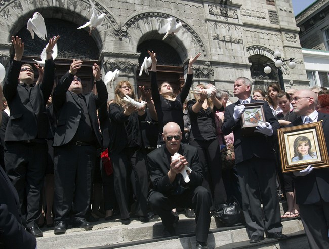 The family of Jolene Riendeau release ten doves after funeral services Friday, May 13, 2011, in Montreal. The disappearance of the 10-year-old after she went to a convenience store in a working-class Montreal neighbourhood in 1999 sparked national headlines and a massive police search. THE CANADIAN PRESS/Ryan Remiorz.