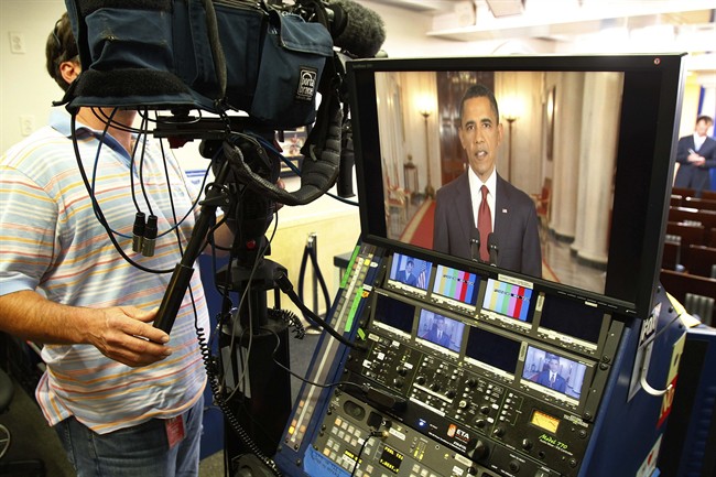 President Barack Obama is seen on a television monitor in the press briefing room as he makes a televised statement on the death of Osama bin Laden from the East Room of the White House in Washington, Sunday, May 1, 2011. (AP Photo/J. David Ake).