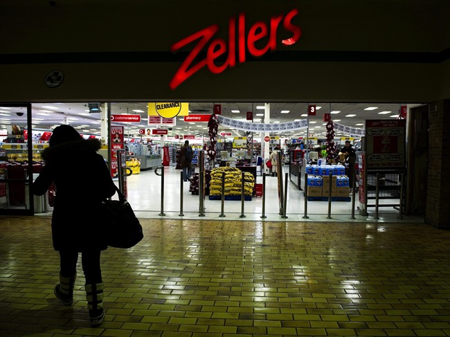 A woman makes her way into Zellers store in Toronto on Jan. 13, 2011.