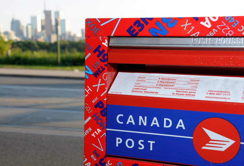 Canada Post, union resume talks as back-to-work legislation looms - image