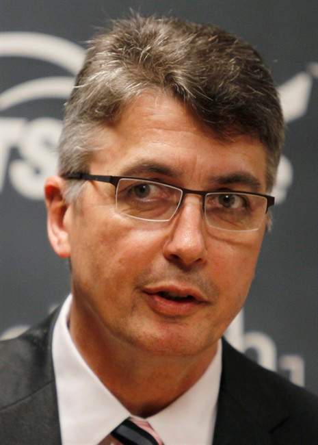 Claude Noel speaks after being introduced as the new head coach of the unnamed Winnipeg NHL franchise during a hockey news conference Friday, June 24, 2011, in Minneapolis. (AP Photo/Genevieve Ross).