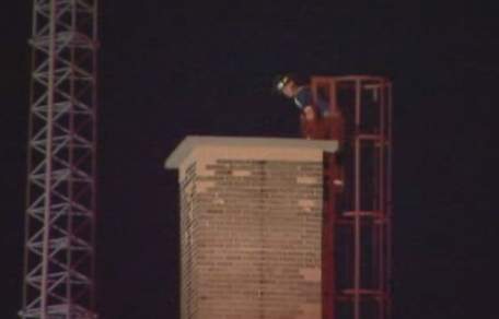 Man in 20s falls through school chimney, breaks ankles - image