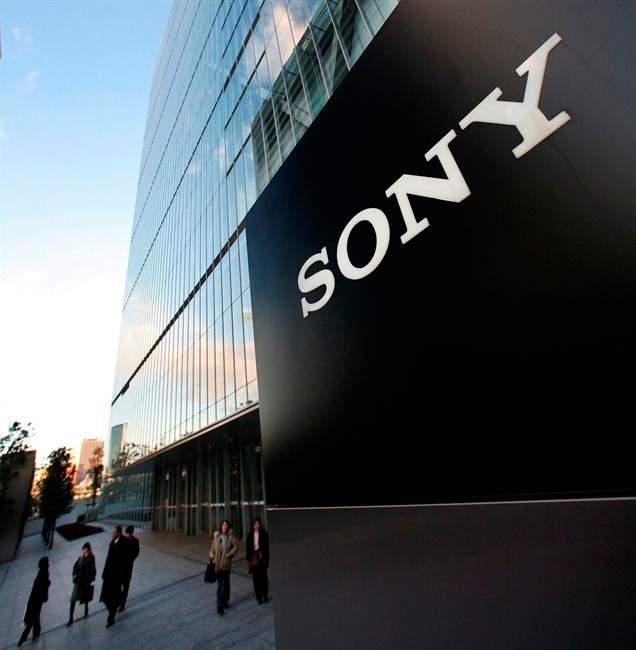 In this Jan. 13, 2009 file photo, people walk outside Sony Corp.'s headquarters in Tokyo. THE CANADIAN PRESS/AP, Itsuo Inouye.