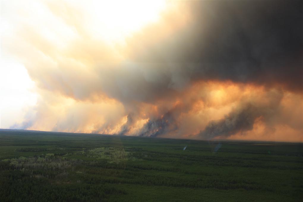 Firefighters, massive water bomber help fight largest Alberta fire in decades - image