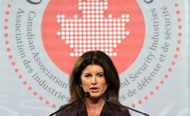 Minister of Public Works and Government Services Rona Ambrose addresses the Canadian Association of Defence and Security Industries in Ottawa, Wednesday June 1, 2011. THE CANADIAN PRESS/ Fred Chartrand.