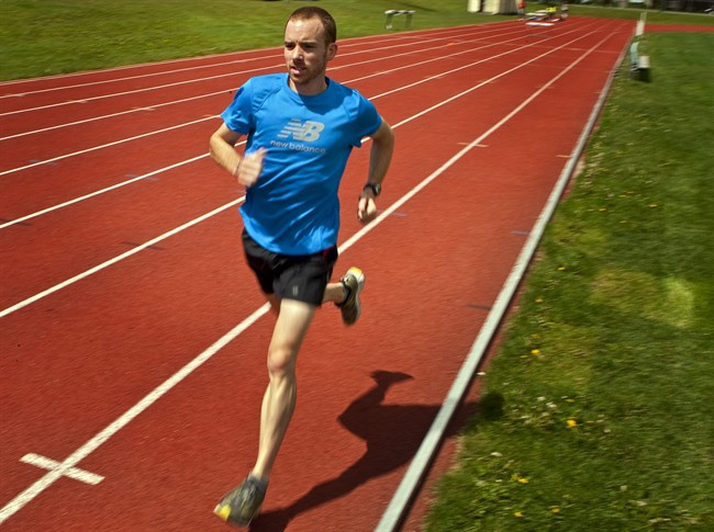 Marathon runner Reid Coolsaet, from Hamilton, Ont., is pictured in 2010. Researchers in Ottawa have discovered running may have the ability to heal the brain.