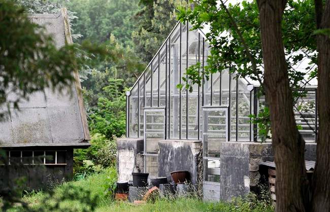 A greenhouse at a vegetable farm is seen in the Uelzen district, northern Germany, Sunday, June 5, 2011. Different kinds of sprouts from the organic farm in the greater Uelzen area, between the northern cities of Hamburg and Hannover, could be traced to infected persons in five different German states, Lower Saxony Agriculture Minister Gert Lindemann told reporters. The farm was shut down Sunday and all of its produce _ including fresh herbs, fruits, flowers and potatoes_ was recalled. At least one of the farm's employees was also infected with the E.coli bacteria, the minister said. (AP Photo/dapd, Axel Heimken).