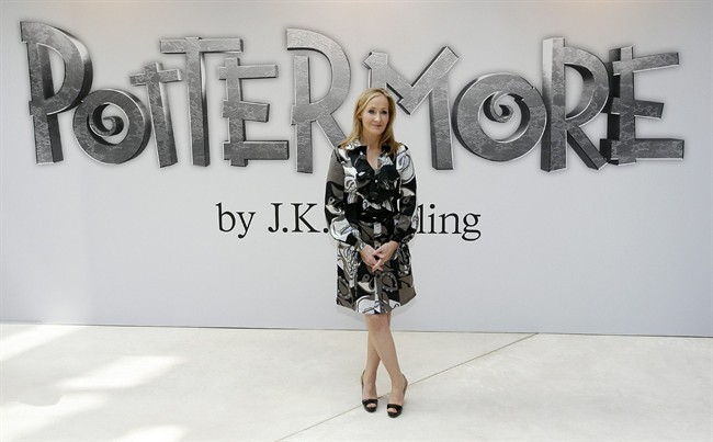 British author J.K. Rowling poses for photographers as she announces her new website project Pottermore at the Victoria and Albert Museum in London, Thursday, June 23, 2011. For the Pottermore project Rowling has written new material about the characters, places and objects in the Harry Potter stories. (AP Photo/Akira Suemori).