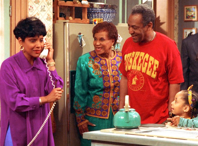 In this 1992 file photo originally released by NBC, Phylicia Rashad, portraying Clair Huxtable, left, talks on the telephone in a scene from "The Cosby Show."