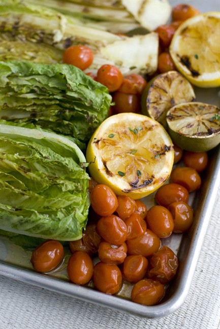 This May 11, 2011 photo shows a grilled salad in Concord, N.H. This simple salad, offered by Lourdes Castro, is as beautiful as it is delicious. (AP Photo/Matthew Mead).