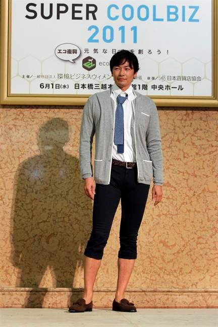 A model presents a casual office wear during a "Super Cool Biz" fashion show Wednesday, June 1, 2011. Japan's "Super Cool Biz" campaign kicked off with the government-sponsored event featuring outfits appropriate for the office yet cool enough to endure the sweltering heat. This summer may be especially brutal. Looming for Japan is a potential power crunch, the result of the March 11 tsunami crippling the Fukushima Dai-ichi nuclear power plant. (AP Photo/Itsuo Inouye).