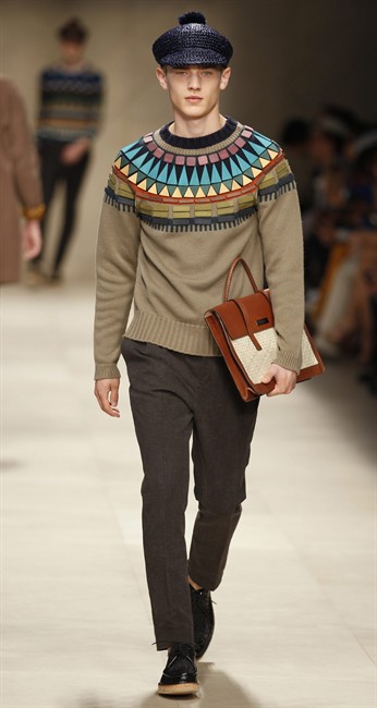 A model wears a creation of Burberry men's Spring-Summer 2012 collection, part of the Milan Fashion Week, in Milan, Italy, Saturday, June 18, 2011. (AP Photo/Luca Bruno).