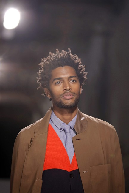 A model wears a creation by British fashion designer Paul Smith as part of his Spring/Summer 2012 fashion collection presented in Paris, Sunday June 26, 2011. (AP Photo/Thibault Camus).