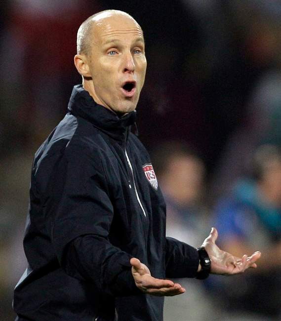 FILE - In this June 12, 2010, file photo, United States head soccer coach Bob Bradley reacts during a World Cup group C match against England at Royal Bafokeng Stadium in Rustenburg, South Africa. Bradley has been fired as head coach of the U.S. men's national team after five years, U.S. Soccer President Sunil Gulati announced Thursday, July 28, 2011. (AP Photo/Elise Amendola, File).
