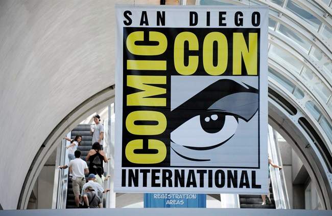 Fans arrive during Preview Night at the Comic-Con 2011 convention Wednesday, July 20, 2011 in San Diego. (AP Photo/Denis Poroy).