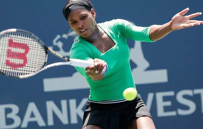 Serena Williams, of the United States, hits a forehand to Marion Bartoli, of France, during the final of the Bank of the West Classic tennis tournament Sunday, July 31, 2011, in Stanford, Calif. (AP Photo/George Nikitin).