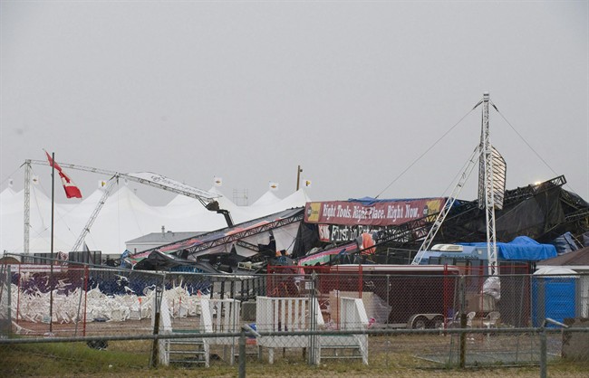 The collapsed main stage at the site of the Big Valley Jamboree in Camrose, Alta. is shown after a storm on August 1, 2009. THE CANADIAN PRESS/John Ulan.