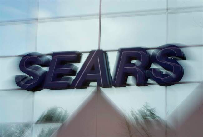 A sign for a Sears store is seen in North Vancouver, B.C. Thursday, Feb 24, 2011. Sears Canada Inc. is making another change in its top ranks, adding a new head of merchandising as it prepares to face an increasingly competitive retail market.THE CANADIAN PRESS/Jonathan Hayward.