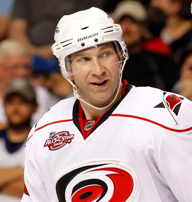 Carolina Hurricanes' Erik Cole, left, is shown on March 25, 2011, in Tampa, Fla. The Montreal Canadiens have signed Cole from the Carolina Hurricanes and goaltender Peter Budaj from the Colorado Avalanche. THE CANADIAN PRESS/AP, Mike Carlson.