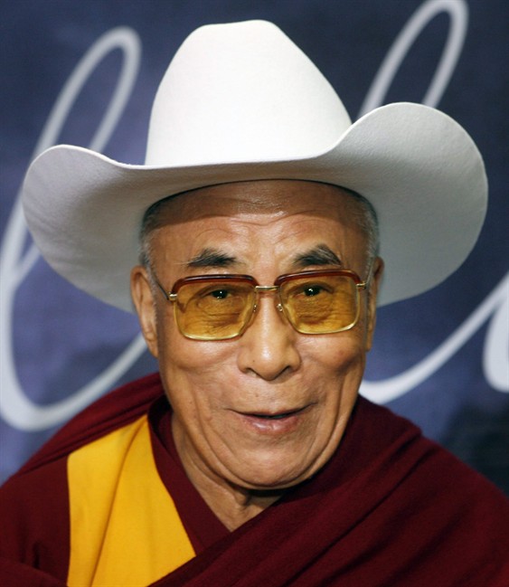 The Dalai Lama wears a white cowboy hat presented to him by Calgary Mayor David Bronconnier after arriving in Calgary, Wednesday, Sept. 30, 2009. Its honourees range from the Dalai Lama to Dr. Phil and now Prince William and Kate are about to join the ranks of Calgary's "white hatters."Custom-made, white Smithbilt cowboy hats have come to symbolize the city and will be presented to the couple as part of the traditional welcome when they arrive Thursday afternoon at the international airport for the final leg of their royal tour. THE CANADIAN PRESS/Jeff McIntosh.