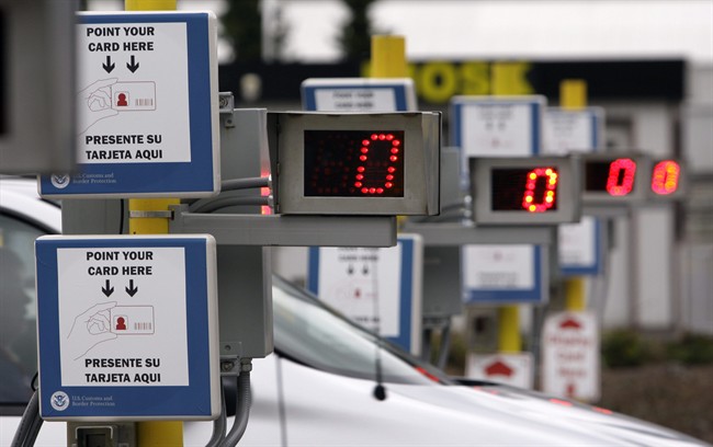 Electronic readers and displays for NEXUS identification cards are lined-up at a border crossing from Canada into the United States at Blaine, Wash., April 9, 2009. Travellers under Canada's Nexus program who are considered low-risk have been caught trying to illegally smuggle goods into the country, newly released documents show. THE CANADIAN PRESS/AP-Elaine Thompson.