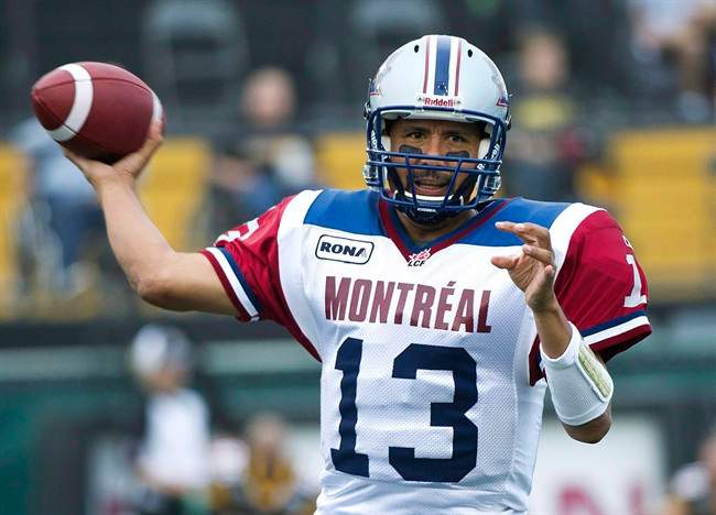Montreal Alouettes quarterback Anthony Calvillo throws the ball against the Hamilton Tiger-Cats during first half CFL football action in Hamilton, Ont., on Wednesday, June 22, 2011. Calvillo is poised to break the first of three Damon Allen career passing records within his reach. The veteran quarterback threw five TD passes Saturday to lead the Montreal Alouettes to a 39-25 road win over the Saskatchewan Roughriders. That gave Calvillo 394 career touchdown passes, tying Allen's league record heading into the Als' home game Friday night versus the Toronto Argonauts. THE CANADIAN PRESS/Nathan Denette.
