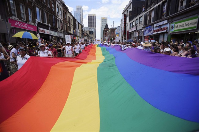 People take part in the annual Pride Parade.