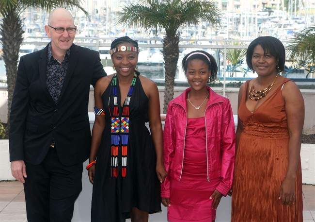 Director Oliver Schmitz (left to right) and actresses Lerato Mvelase, Khomotso Manyaka and Harriet Manamela pose during a photo call for the film "Life, Above All", at the 63rd international film festival, in Cannes, southern France, Tuesday, May 18, 2010. THE CANADIAN PRESS/AP-Lionel Cironneau.