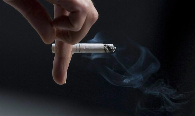 A judge has awarded $15 billion to Quebec smokers in a landmark case that pitted them against three Canadian tobacco giants.