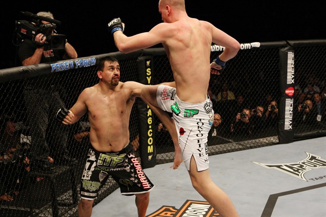 Dutch heavyweight Stefan (Skyscraper) Struve (right) attacks Paul Buentello at UFC 107 on Dec. 12, 2009. Stefan (Skyscraper) Struve will fight Pat (HD) Barry on the UFC's televised card Oct. 1, 2011, at the Verizon Center in Washington, D.C. THE CANADIAN PRESS/ HO- UFC - Josh Hodges.