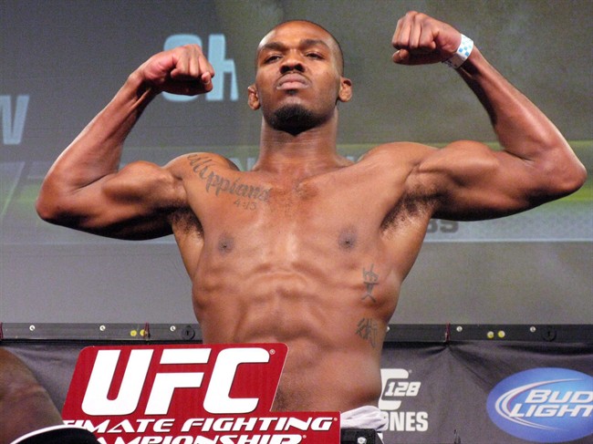 Challenger Jon (Bones) Jones weighs in ahead of his UFC 128 main event on March 18, 2011, in Newark, N.J. If light-heavyweight champion Jon (Bones) Jones does end up meeting the winner of the UFC 133 main event between former title-holders Rashad Evans and Tito (The Huntington Beach Bad Boy) Ortiz, he'll know what to expect. THE CANADIAN PRESS/ Neil Davidson.