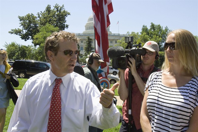 Sen. Rand Paul, R-Ky. arrives at a Tea Party rally on Capitol Hill in Washington, Wednesday, July 27, 2011. (AP Photo/Harry Hamburg).