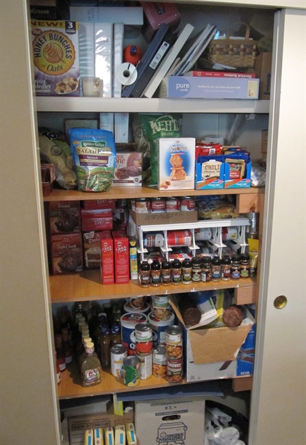 In this photo taken Tuesday, June 28, 2011, extreme coupon cutter Monica Knight shows the stockpile of food she has stored at her home in Boise, Idaho. Knight, a dental hygienist and mother of two, used to spend spent $600 a month on groceries. Thanks to extreme couponing she's down to $100-150 a month. (AP Photo/Jessie L. Bonner).