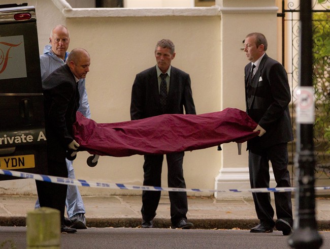A body, believed to be that of singer Amy Winehouse, is removed from her home following her death, in north London, Saturday, July 23, 2011. Amy Winehouse, the beehived soul-jazz diva whose self-destructive habits overshadowed a distinctive musical talent, was found dead Saturday, July 23, 2011 in her London home, police said. She was 27.(AP Photo/Joel Ryan).