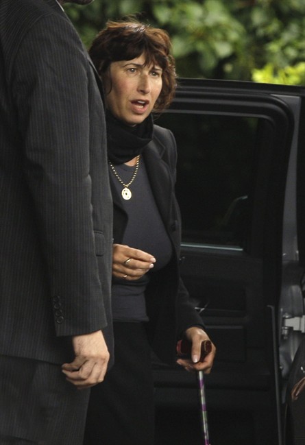 British singer Amy Winehouse's mother Janis arrives at Golders Green Crematorium in north London, Tuesday, July 26, 2011 for the funeral of her daughter Amy Winehouse, the soul diva, who had battled alcohol and drug addiction, and was found dead Saturday at her London home. She was 27. Friends and family said goodbye to Amy Winehouse Tuesday with prayers, tears, laughter and song at a funeral ceremony in London. (AP Photo/Joel Ryan).