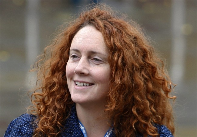 FILE - In this Oct. 6, 2009 file photo, Rebekah Brooks, chief executive of News International, which publishes the News of the World tabloid, arrives at the Conservative Party Conference in Manchester, England. Britain's long-running phone hacking scandal took a sickening twist Tuesday, July 5, 2011, with claims that a the News of the World hacked into the phone mail of an abducted teenage girl and may have hampered the police investigation into her disappearance. Brooks said in an email to her staff that the "strongest possible" actions would be taken if the charges were found to be true. Brooks said in the email that she had no knowledge of the alleged hacking and that she would not resign. (AP Photo/Jon Super, File).