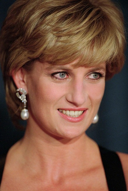 FILE -- In this Dec. 11, 1995 file photo, Diana, Princess of Wales, smiles at the United Cerebral Palsy's annual dinner at the New York Hilton. Princess Diana would have been 50 years old on Friday, July 1, 2011, perhaps the only certainty about the course of a life abruptly cut short in a 1997 car crash in Paris, with a new boyfriend, two months past her 36th birthday. (AP Photo/ Mark Lennihan,file).