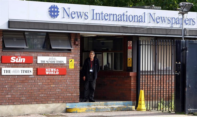 A general view of the main entrance to News International Newspapers Ltd, in Wapping, east London, as News International announced it is shutting down the News of the World, the best-selling tabloid at the center of Britain's phone hacking scandal Thursday July 7, 2011. James Murdoch, who heads European operations for the paper's parent company, said the 168-year-old weekly newspaper would publish its last edition on Sunday, without ads. (AP Photo/Sean Dempsey/PA Wire) UNITED KINGDOM OUT NO SALES NO ARCHIVE.